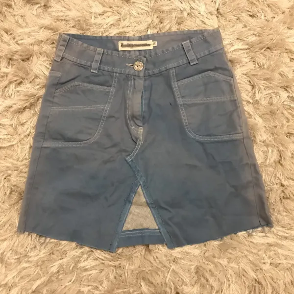 Old broken trousers turned into skirt