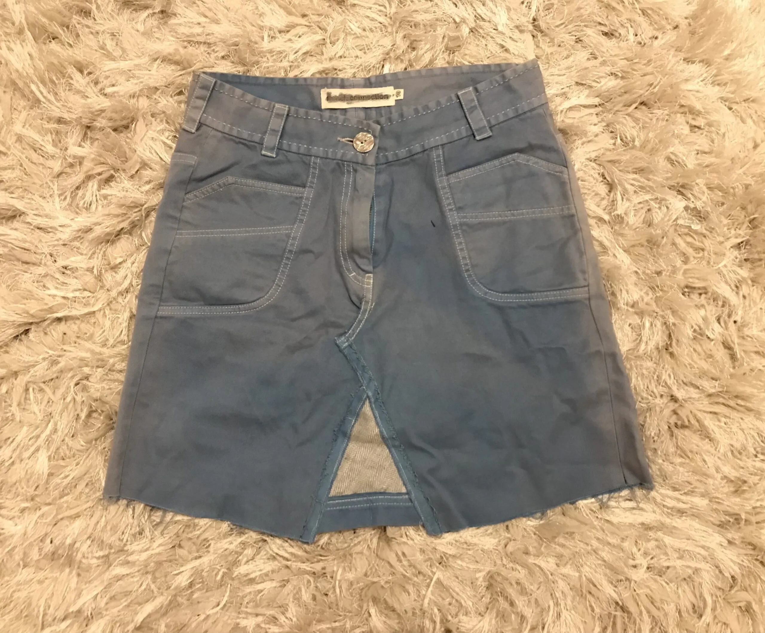 Old broken trousers turned into skirt