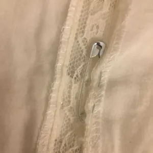 Quick repair of hole in top with safety pin