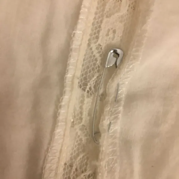 Quick repair of hole in top with safety pin