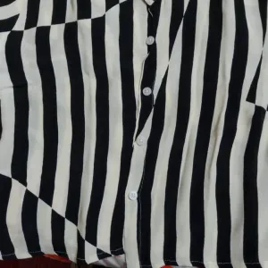 Shirt button