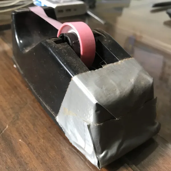Silver tape dispenser