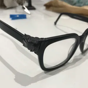 Traditional glasses fixed with tape