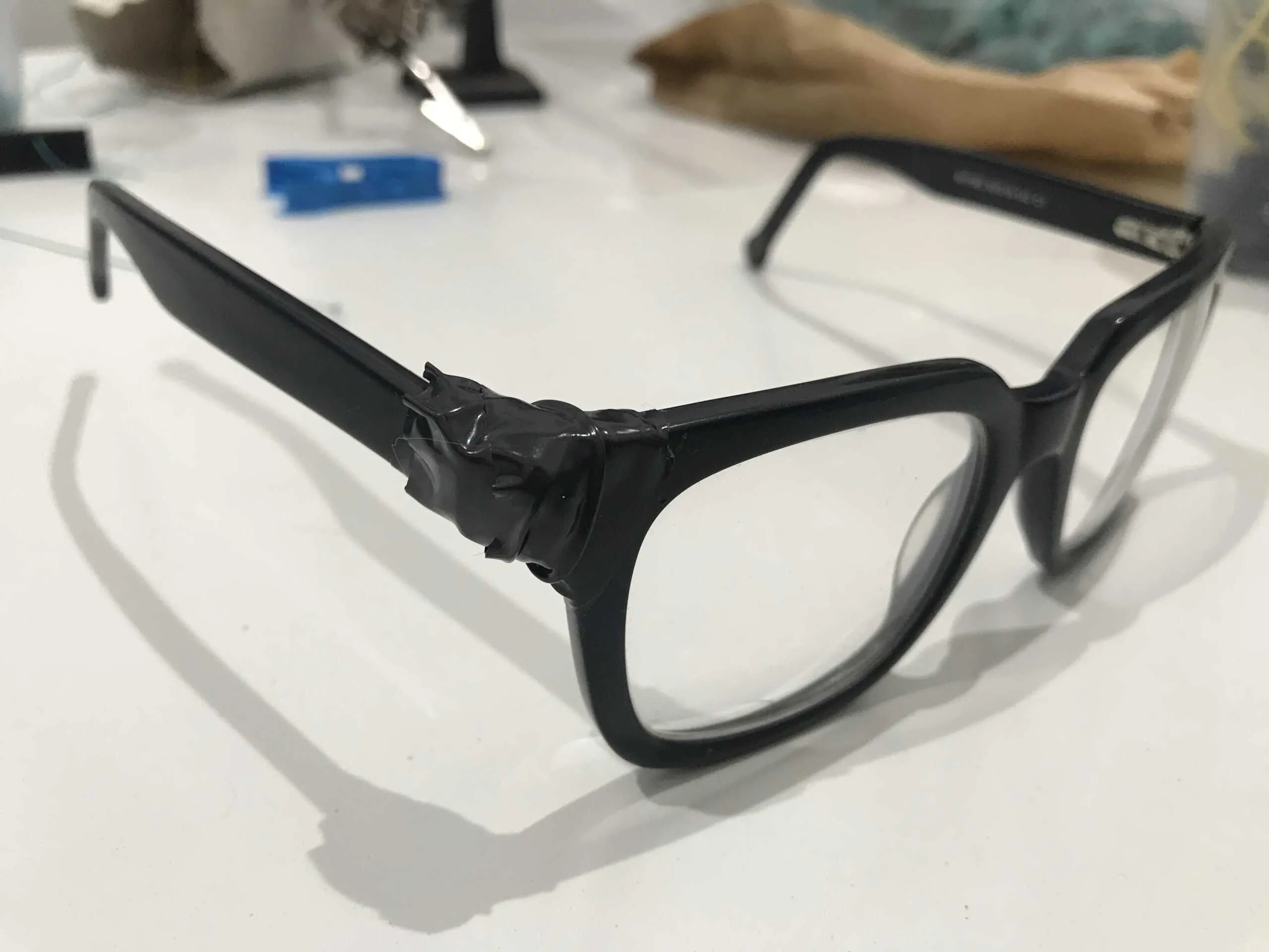 Traditional glasses fixed with tape