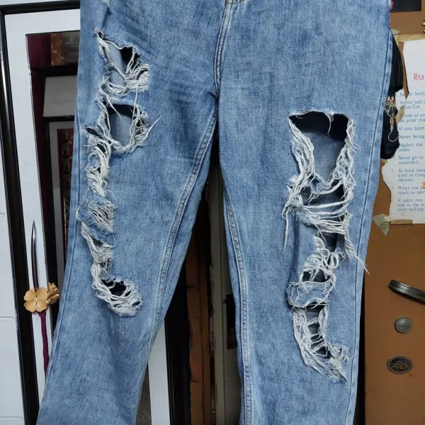 Turned torn jeans into a design