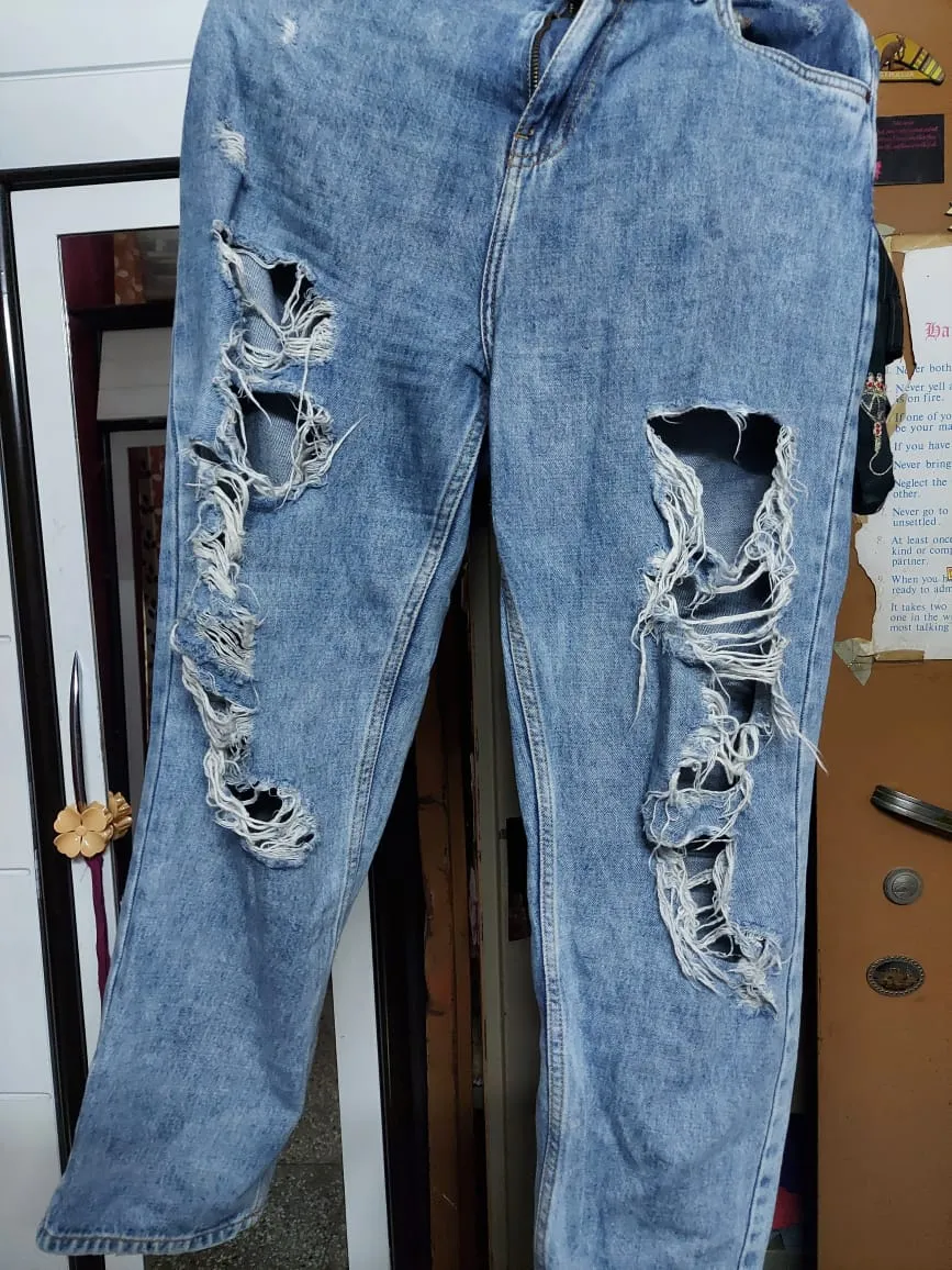 Turned torn jeans into a design